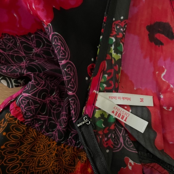 Floral hi-low Romper with tie belt and skirt. - Picture 9 of 12